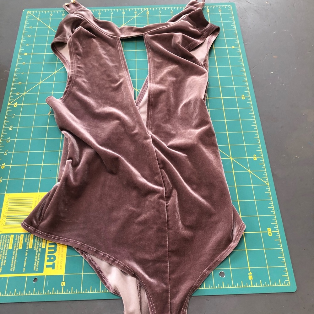 Purple velvet body suit